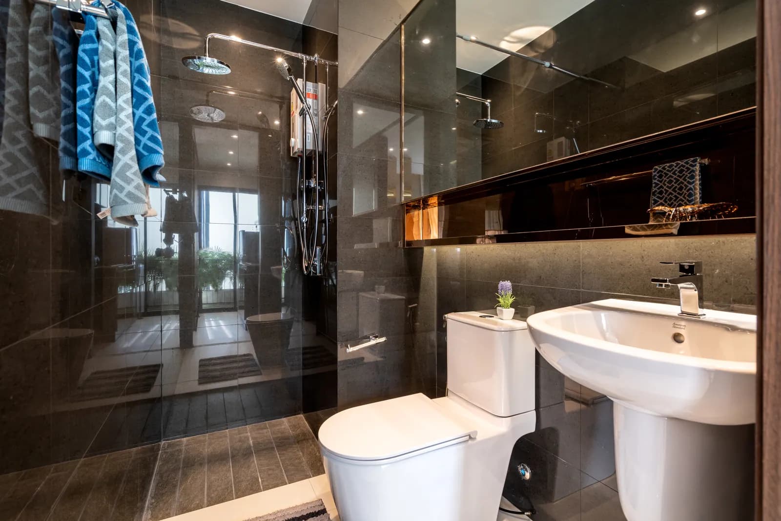 VIP Great Hill, Phuket: bathroom with dark tiles in the 22.5 m² show studio