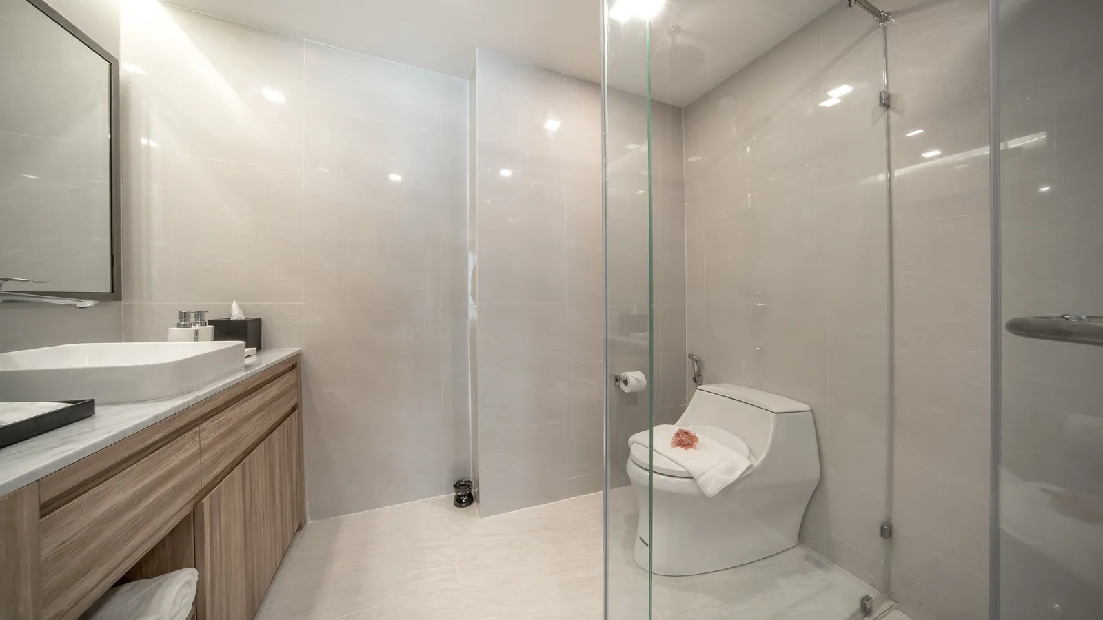 Wyndham La Vita, Phuket: studio bathroom with a glass shower enclosure