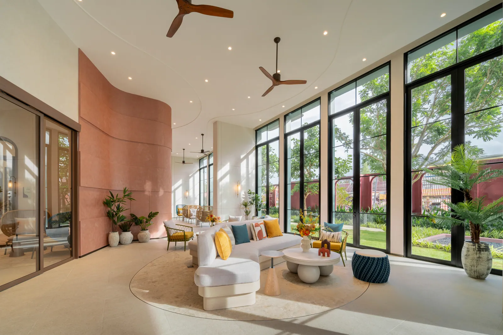 The Base Bukit, Phuket: completed lobby with garden-facing windows
